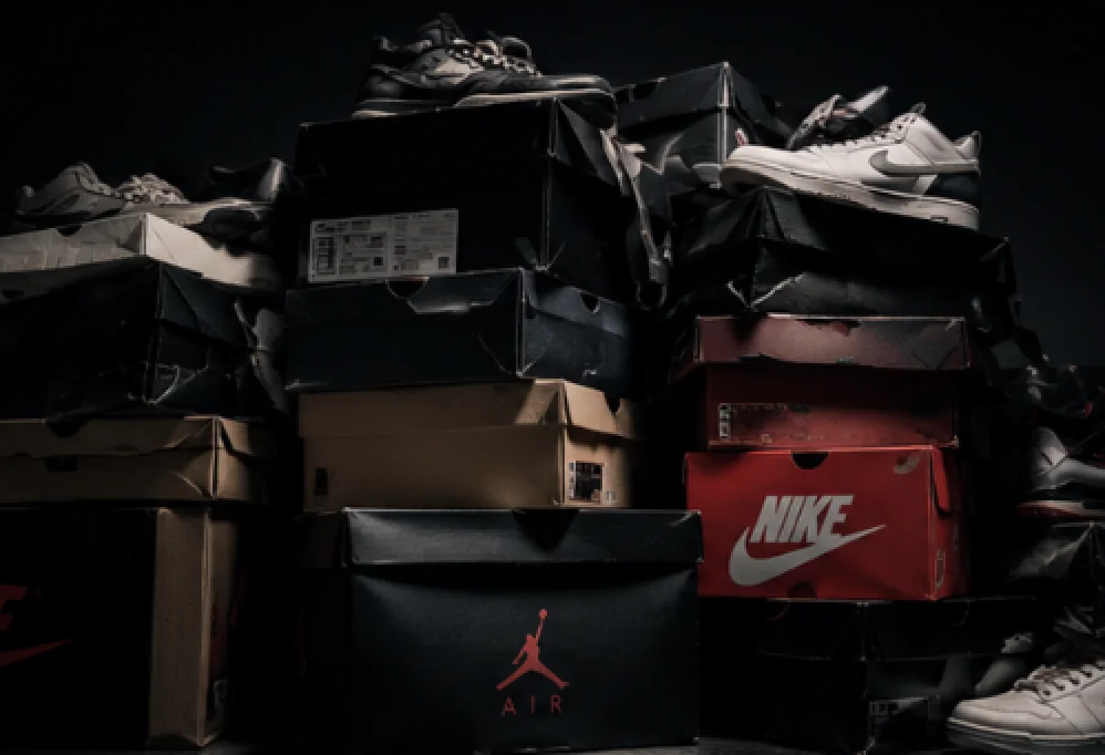 Sneakers piled among traditional storage boxes