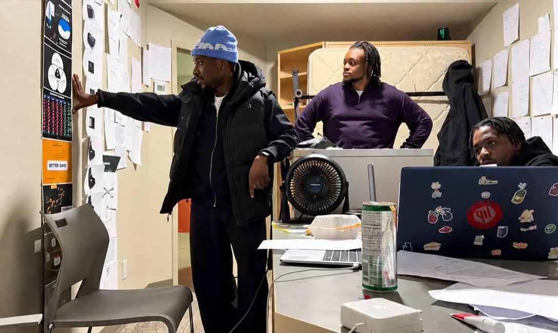 The founders working through sketches and notes while building the Sole Pod